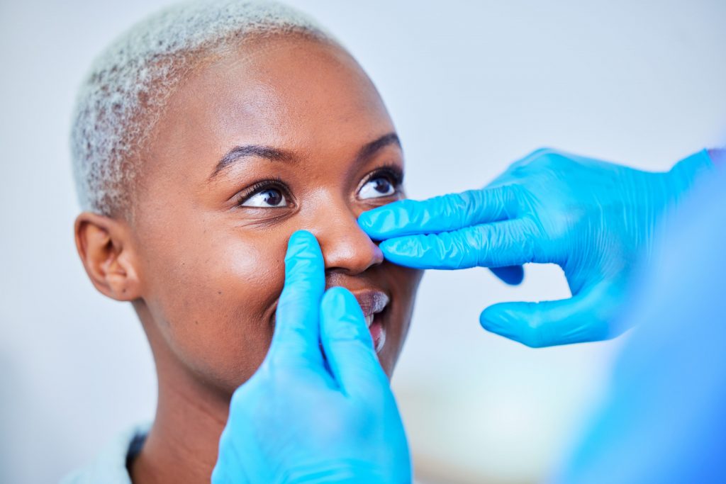 Woman with nasal congestion