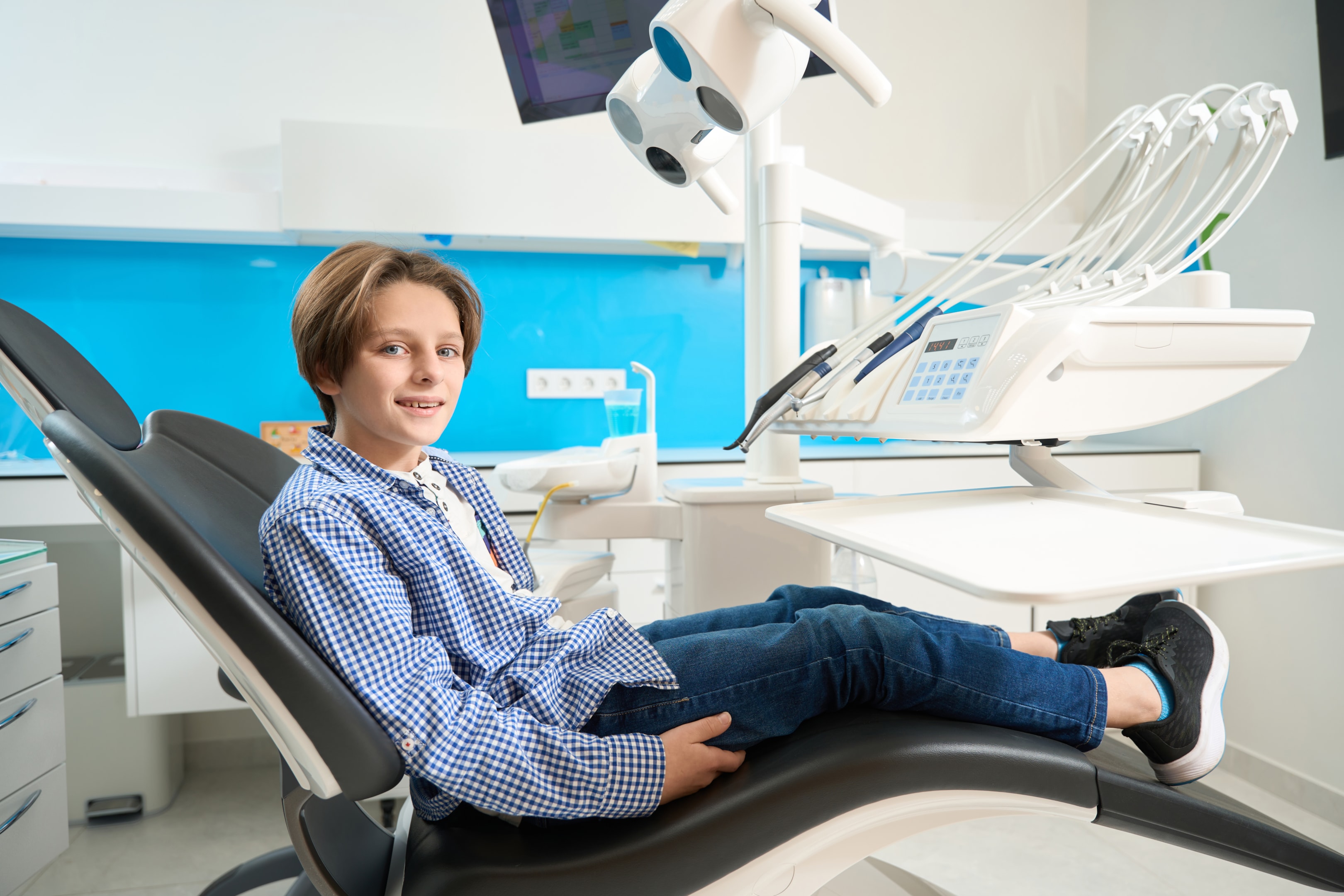 kid having to getting wisdom teeth removed early