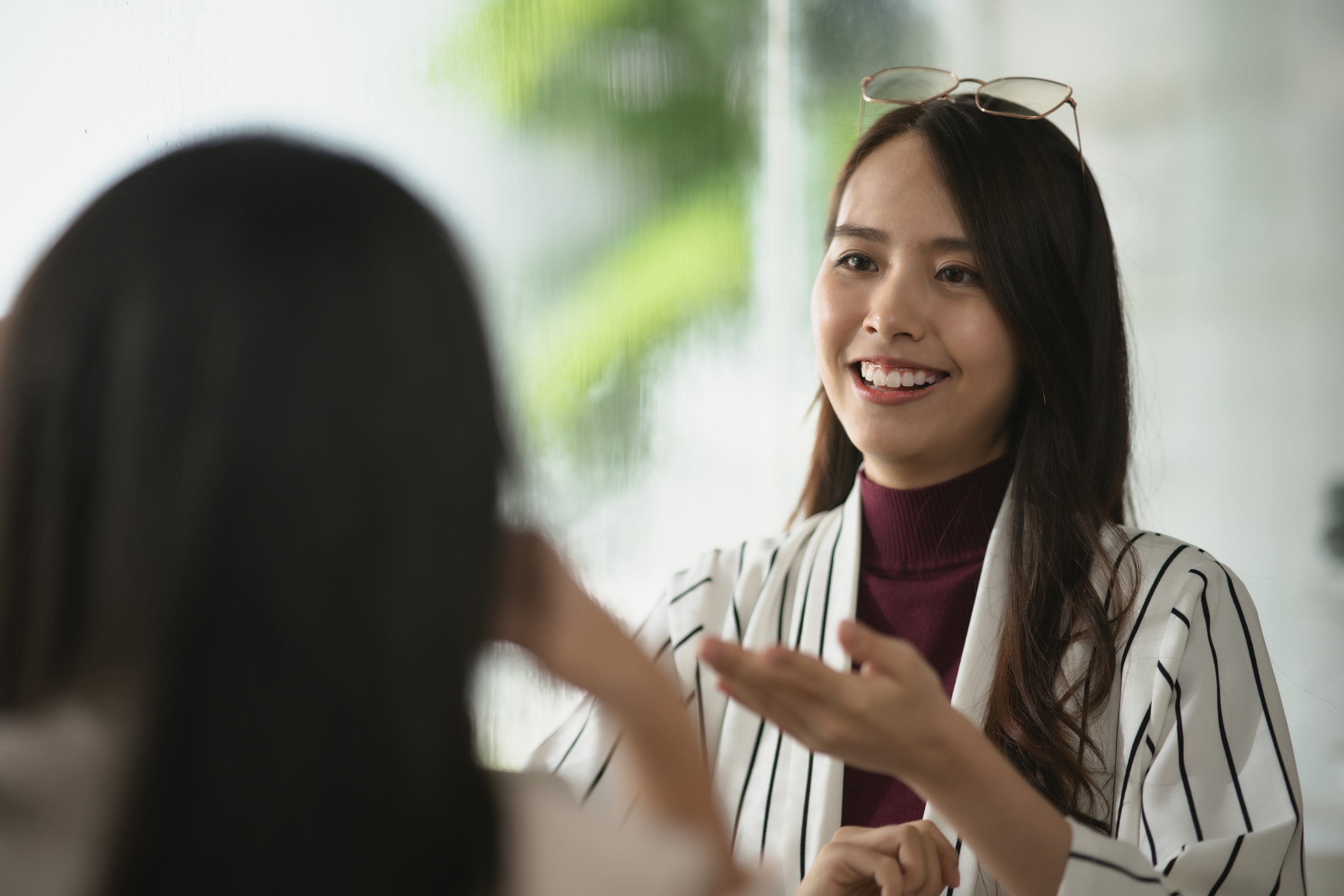 Woman speaking comfortably after wisdom tooth removal