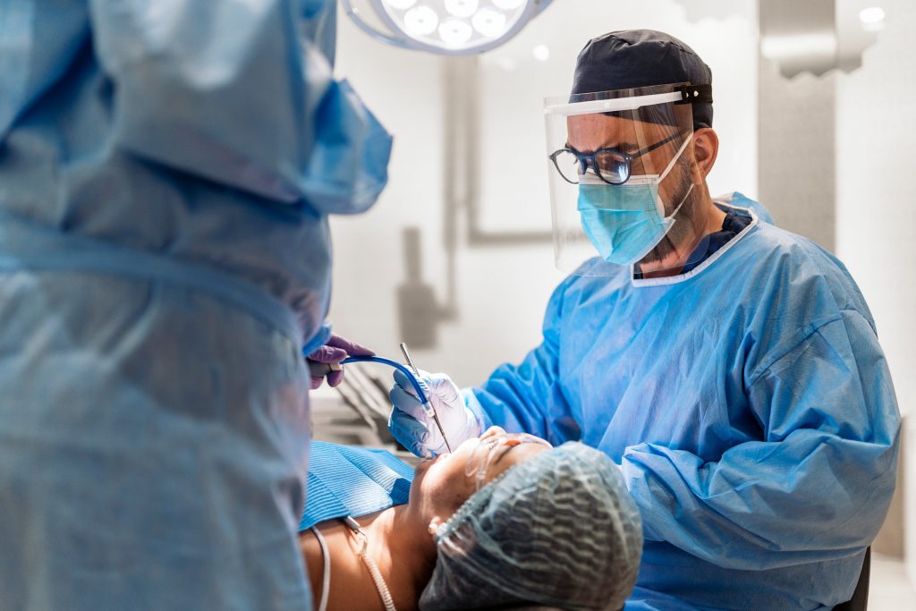 An image during mandibular osteotomy putting plates and screws