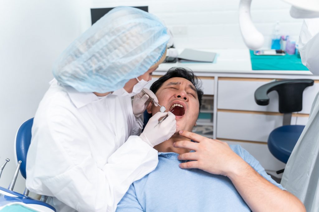 An image during dental surgery for crowded wisdom teeth.